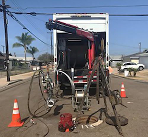 Truck near manhole in San Diego